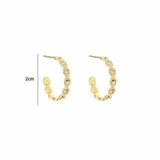 Michelle Bijoux Ear studs with a lot of zirconia stones