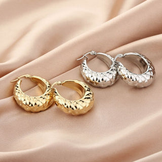 Ohrringe von Michelle Bijoux, verziert mit einem runden Ring