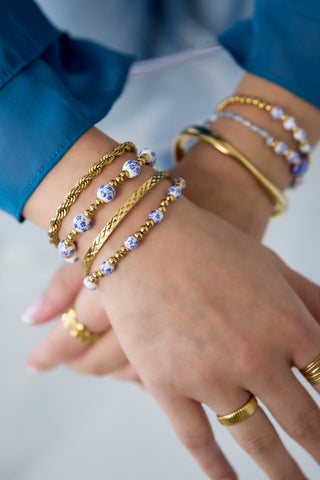 Bijoutheek Armband (Sieraad) Kralen Blauw Wit Balletjes