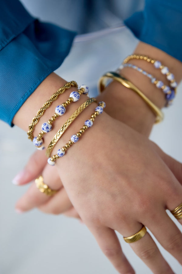 Bijoutheek Armband (Sieraad) Kralen Blauw Wit Balletjes