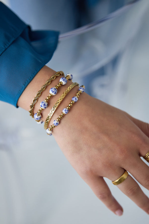 Bijoutheek Armband (Sieraad) Kralen Blauw Wit Balletjes