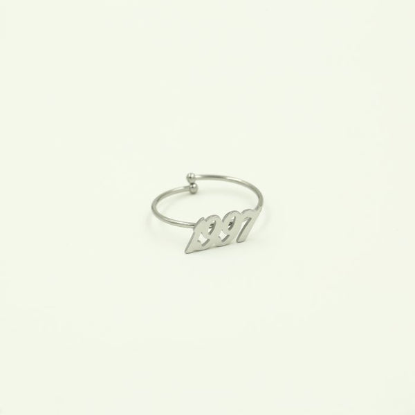 Michelle Bijoux silver colored open initial year ring